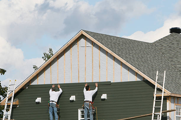Professional Siding technician working in King, NC